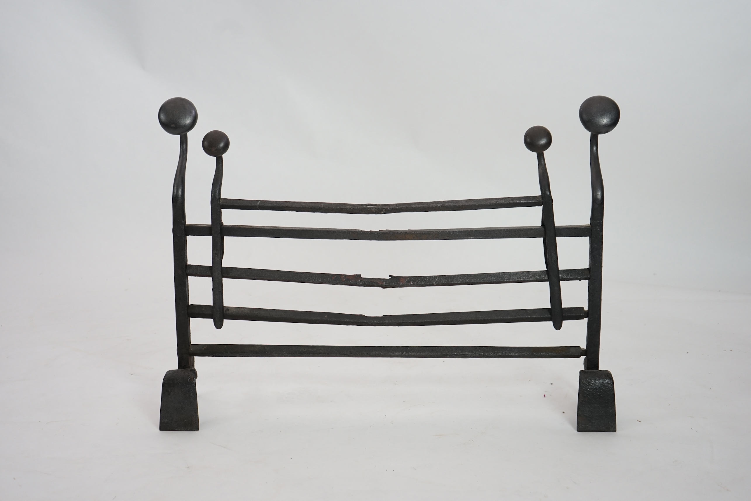 A 17th century French iron adjustable grate